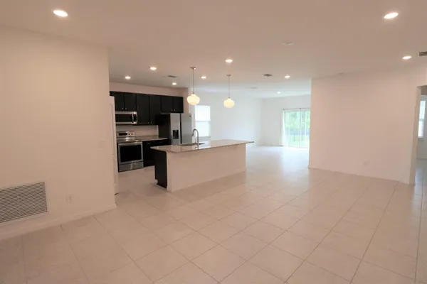 a view of a kitchen with a sink