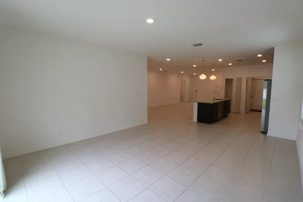 a view of kitchen and a window
