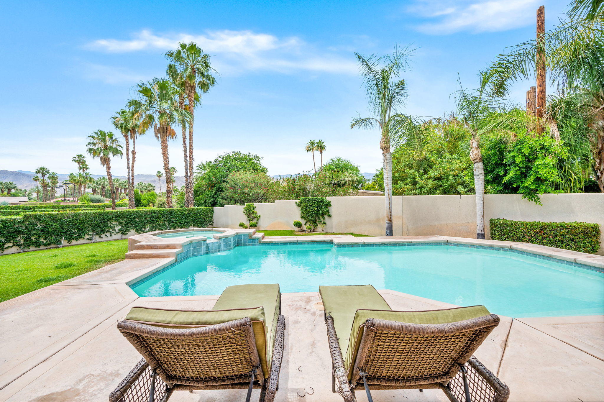 70615 Sunny Lane Rancho Mirage, CA 92270 - Photo 17 of 41 a view of a backyard with sitting area