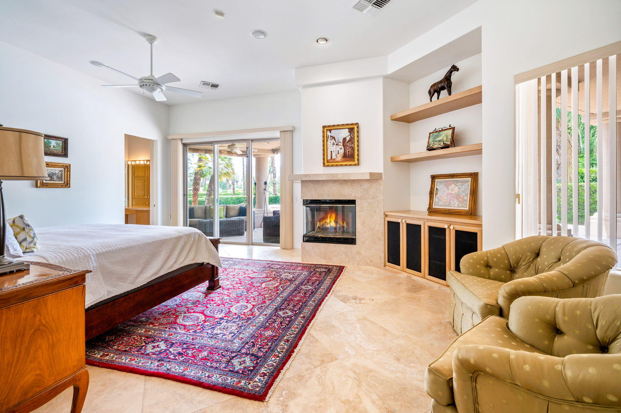 70615 Sunny Lane Rancho Mirage, CA 92270 - Photo 21 of 41 a spacious bedroom with a bed and a couch