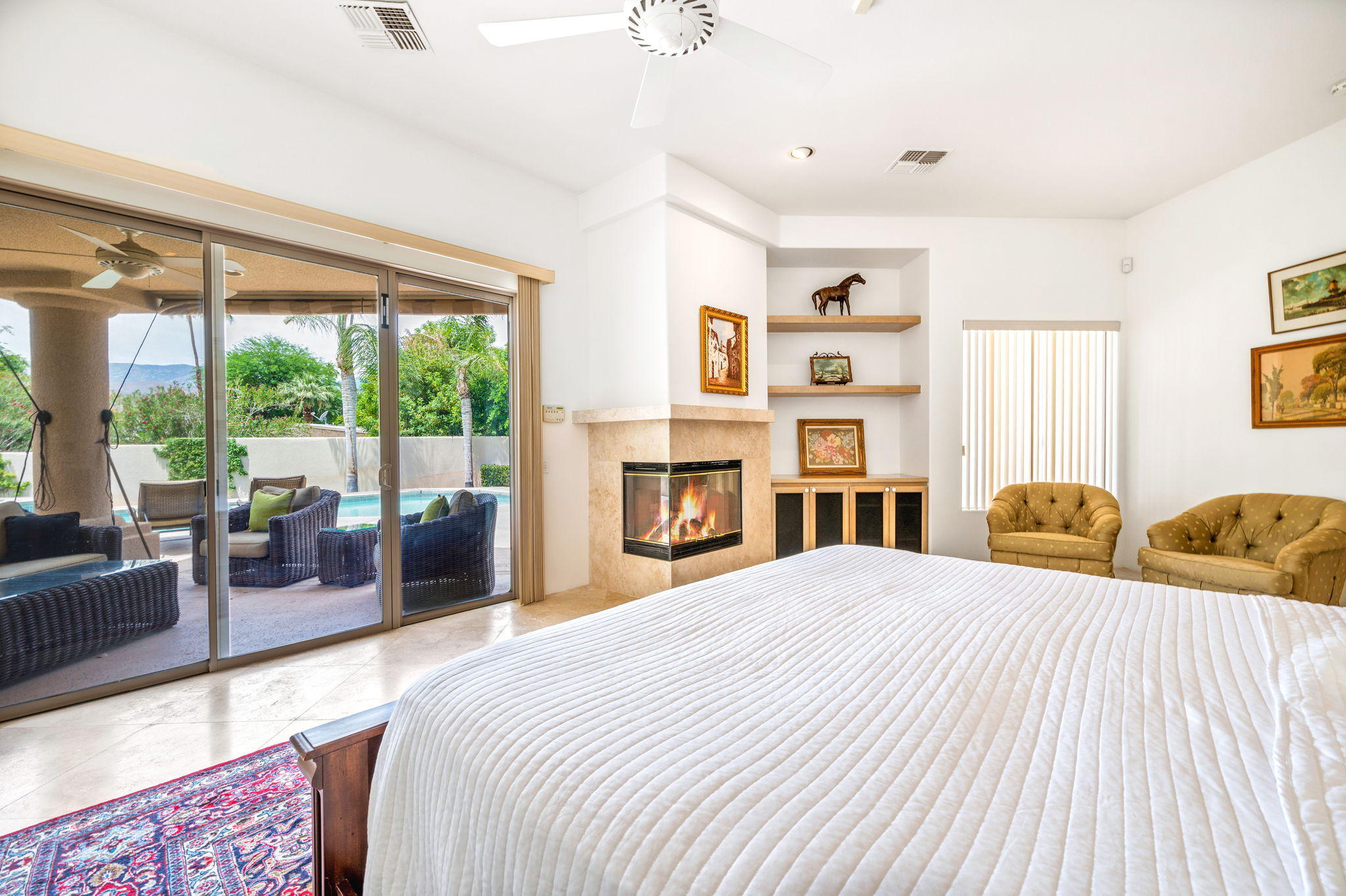 70615 Sunny Lane Rancho Mirage, CA 92270 - Photo 22 of 41 a bedroom with a large bed and a large window