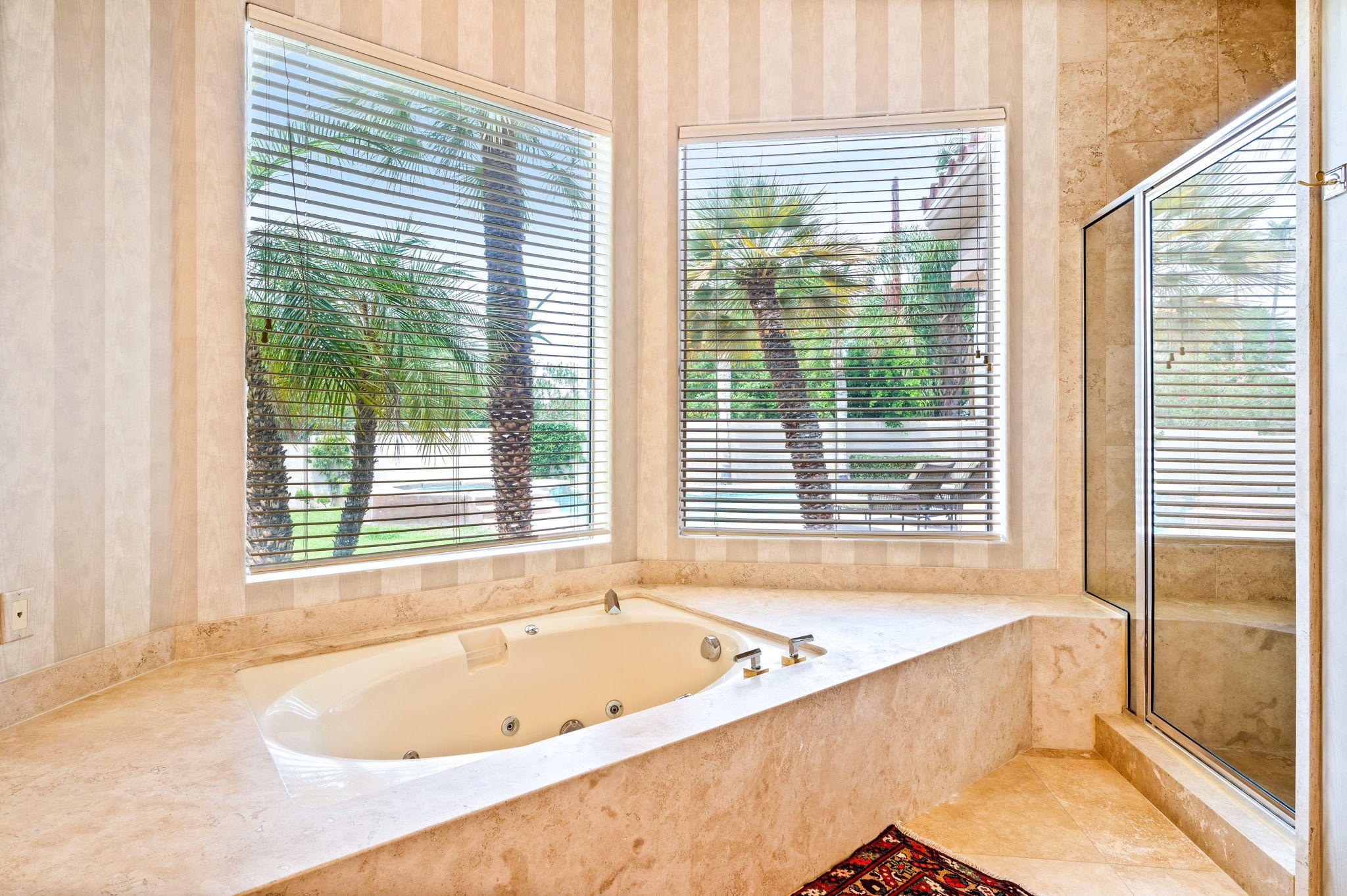 70615 Sunny Lane Rancho Mirage, CA 92270 - Photo 24 of 41 a bathroom with bathtub and next to a window