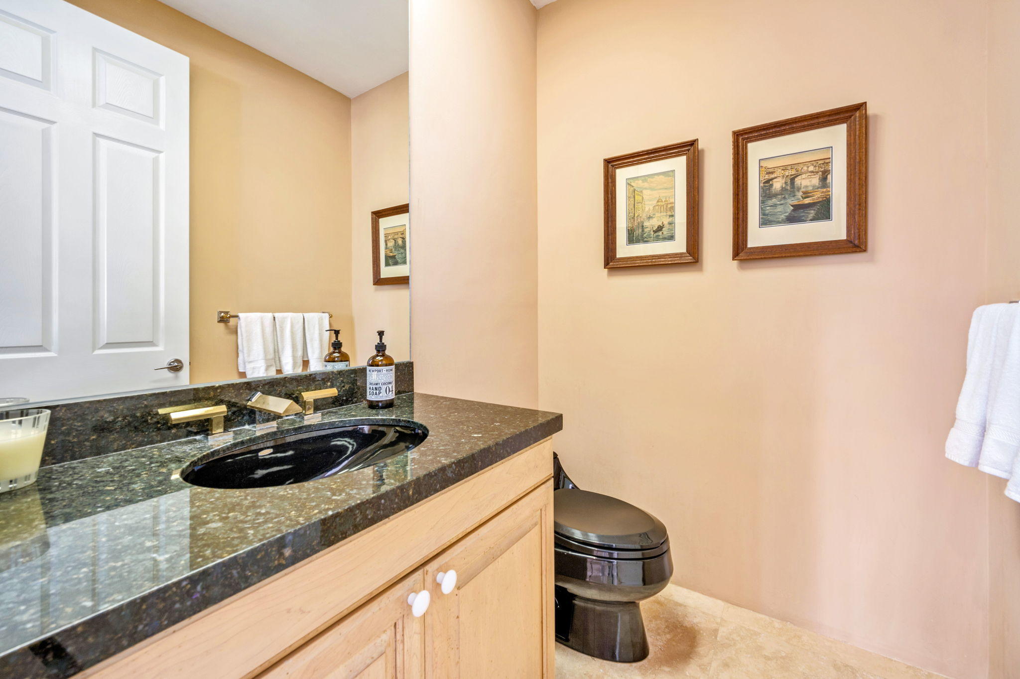 70615 Sunny Lane Rancho Mirage, CA 92270 - Photo 27 of 41 a kitchen with a sink and a stove with wooden floor