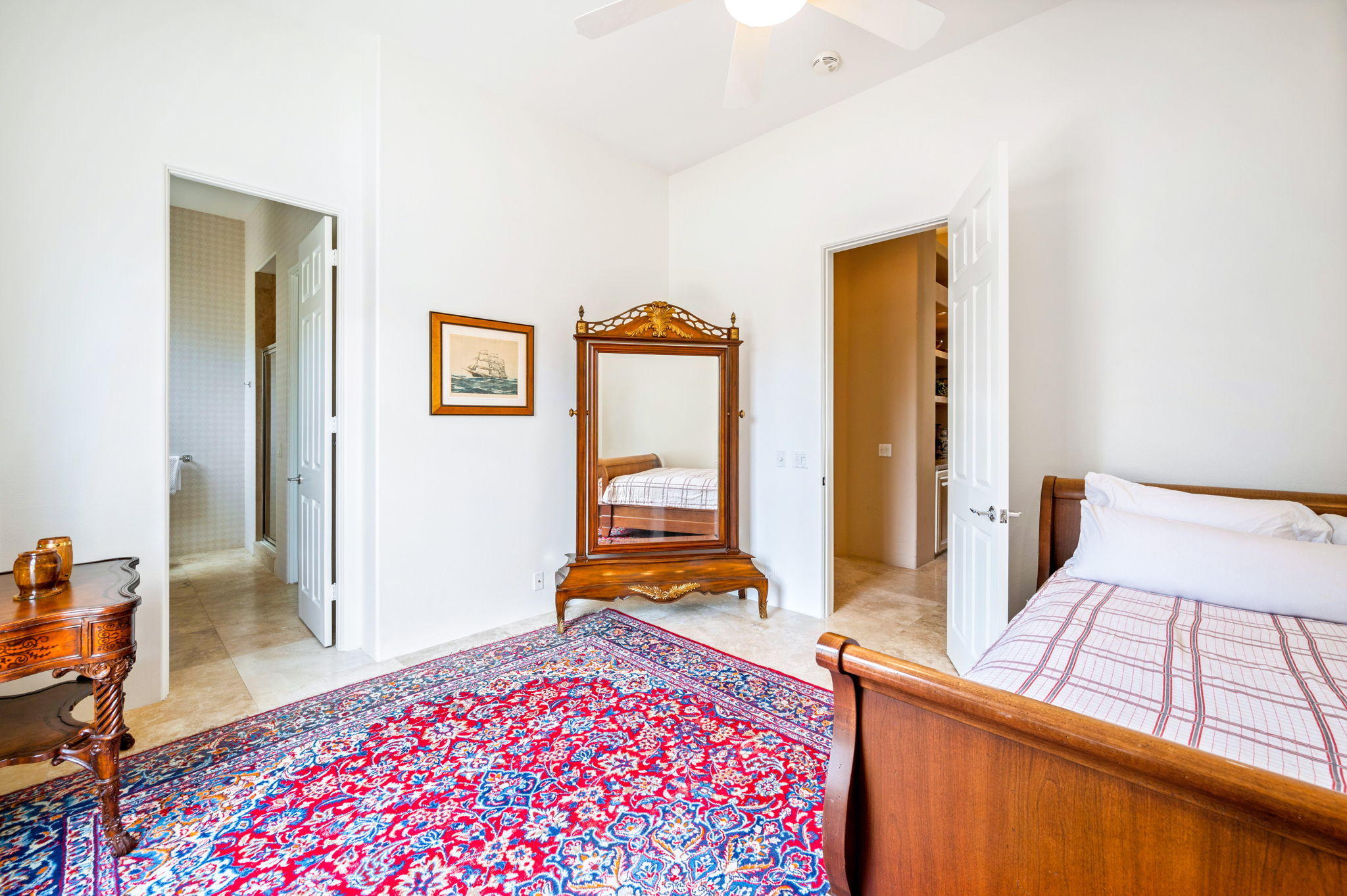 70615 Sunny Lane Rancho Mirage, CA 92270 - Photo 28 of 41 a bedroom with a bed and a dresser next to a window