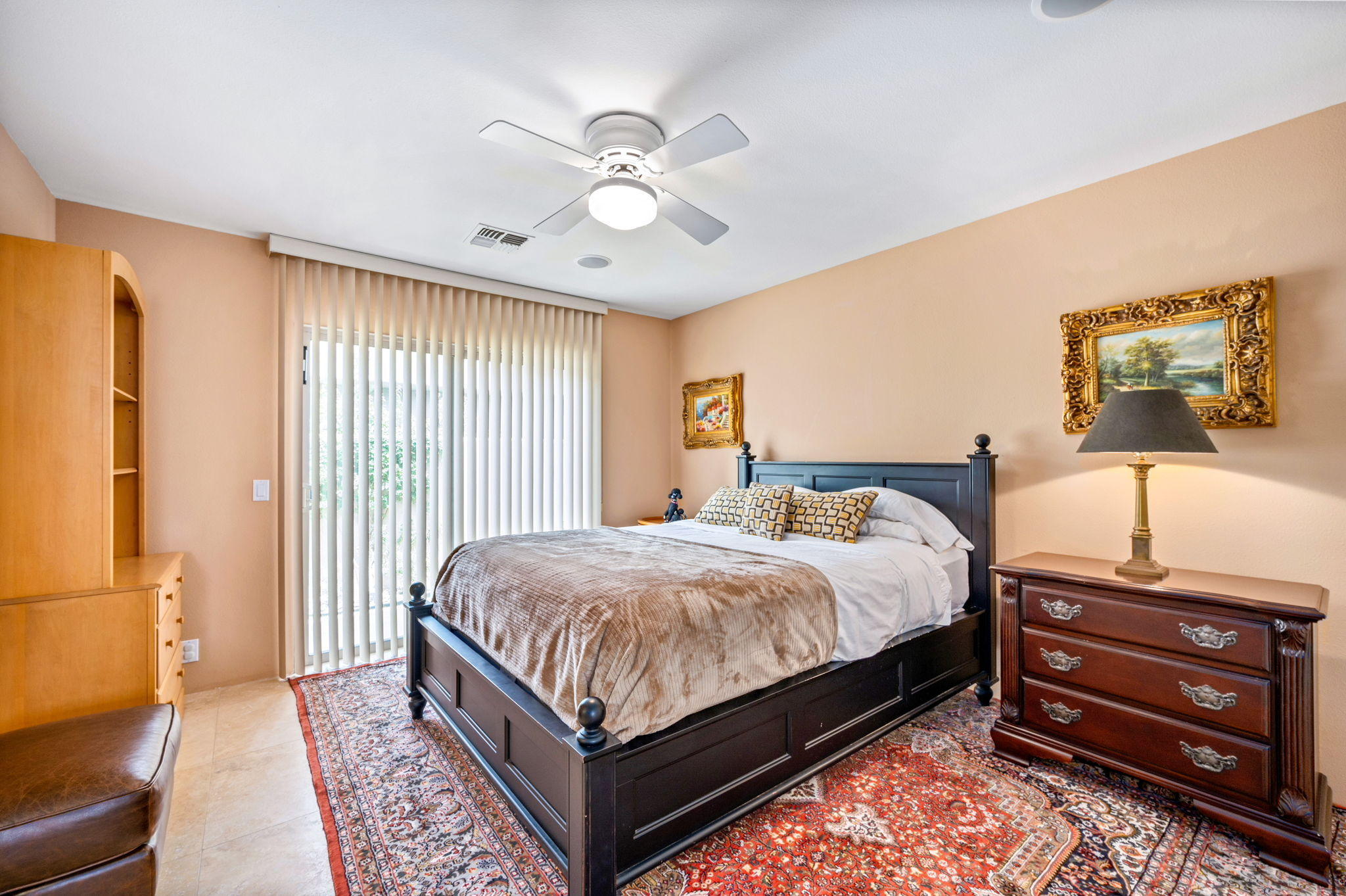 70615 Sunny Lane Rancho Mirage, CA 92270 - Photo 33 of 41 a bed room with a bed and a chandelier