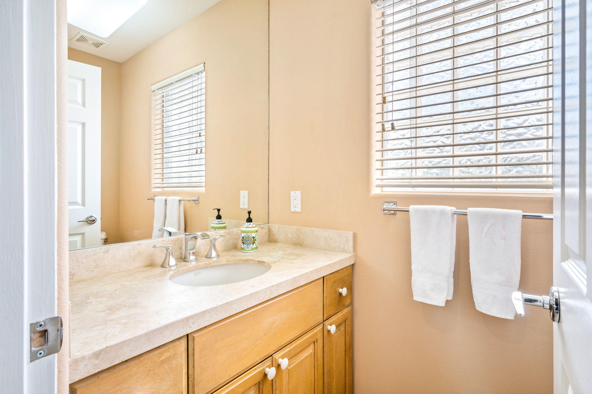 70615 Sunny Lane Rancho Mirage, CA 92270 - Photo 35 of 41 a bathroom with a sink and a mirror