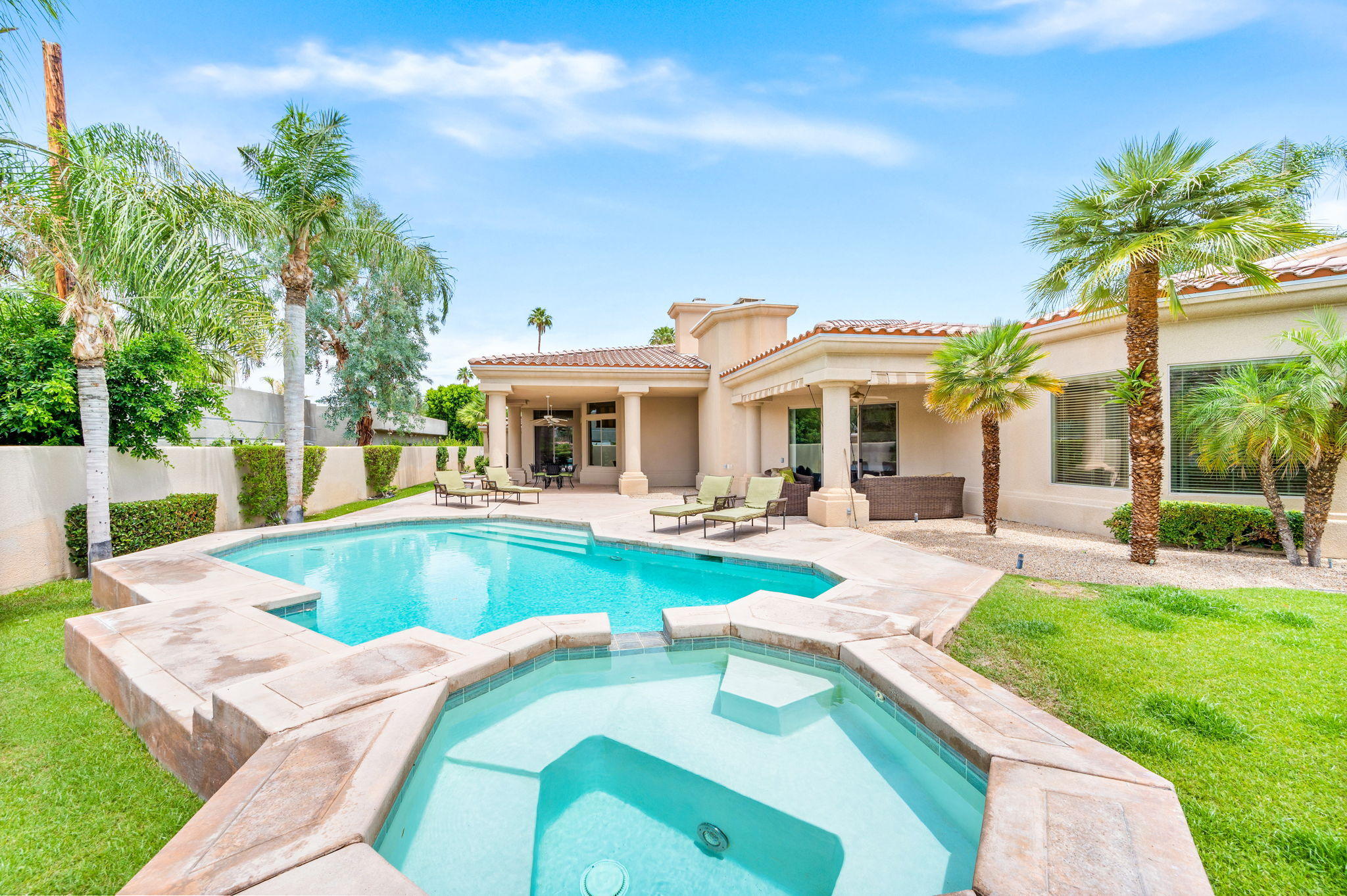70615 Sunny Lane Rancho Mirage, CA 92270 - Photo 37 of 41 a view of a house with swimming pool and sitting area