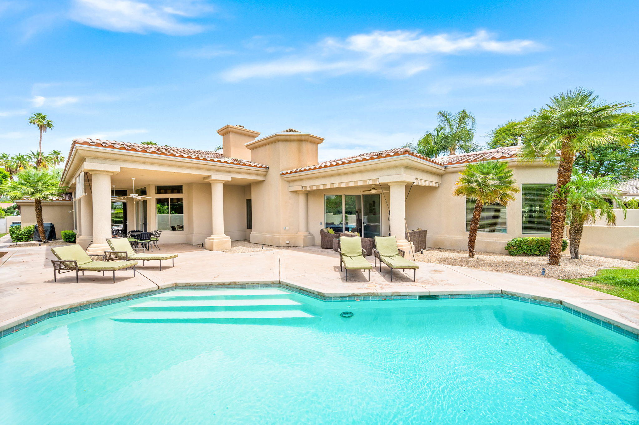 70615 Sunny Lane Rancho Mirage, CA 92270 - Photo 38 of 41 a view of a house with a backyard porch and sitting area