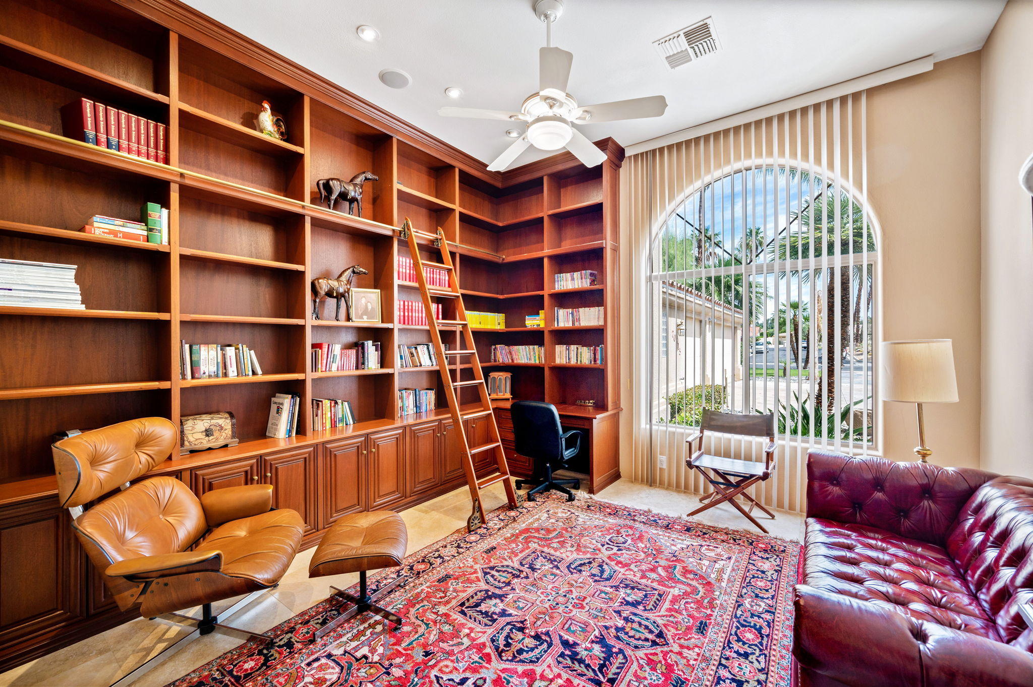 70615 Sunny Lane Rancho Mirage, CA 92270 - Photo 5 of 41 a view of a livingroom with workspace and a couch