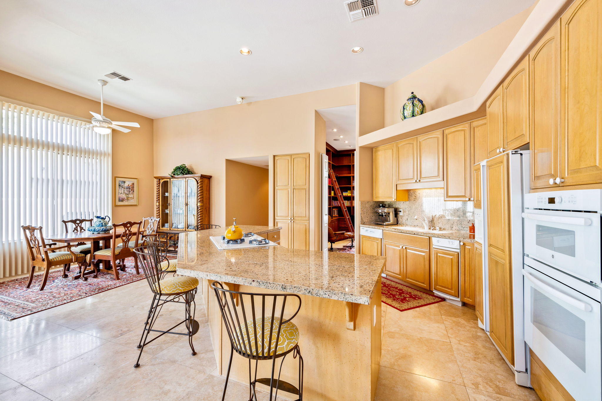 70615 Sunny Lane Rancho Mirage, CA 92270 - Photo 10 of 41 a very nice looking kitchen with a large window appliances and furniture