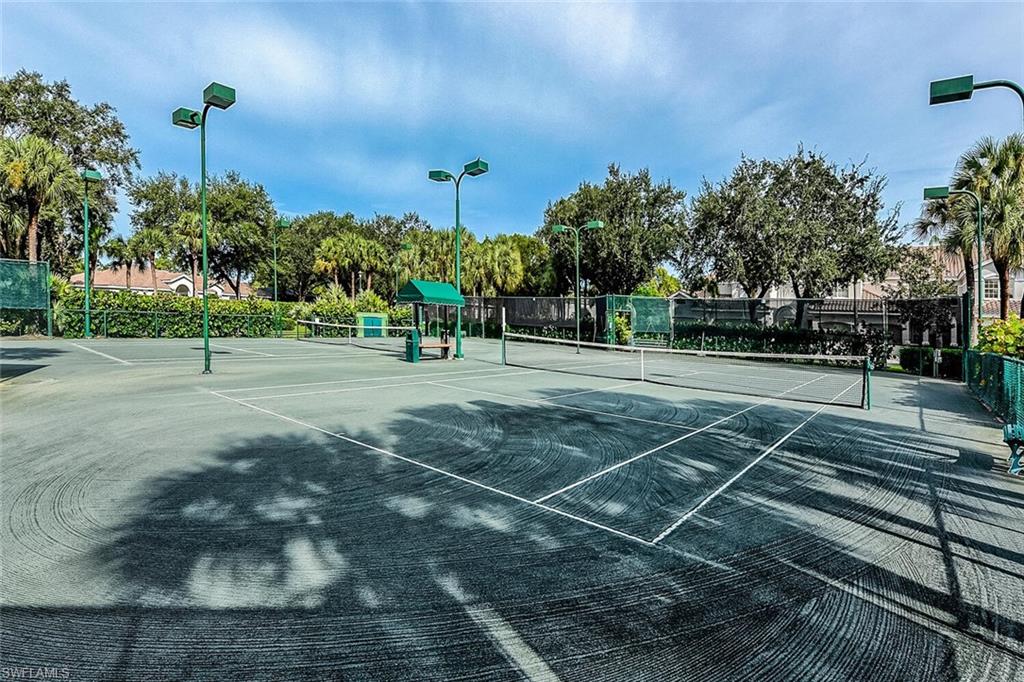 6910 Satinleaf Road North, Unit 101 Naples, FL 34109 - Photo 27 of 30 View of sport court