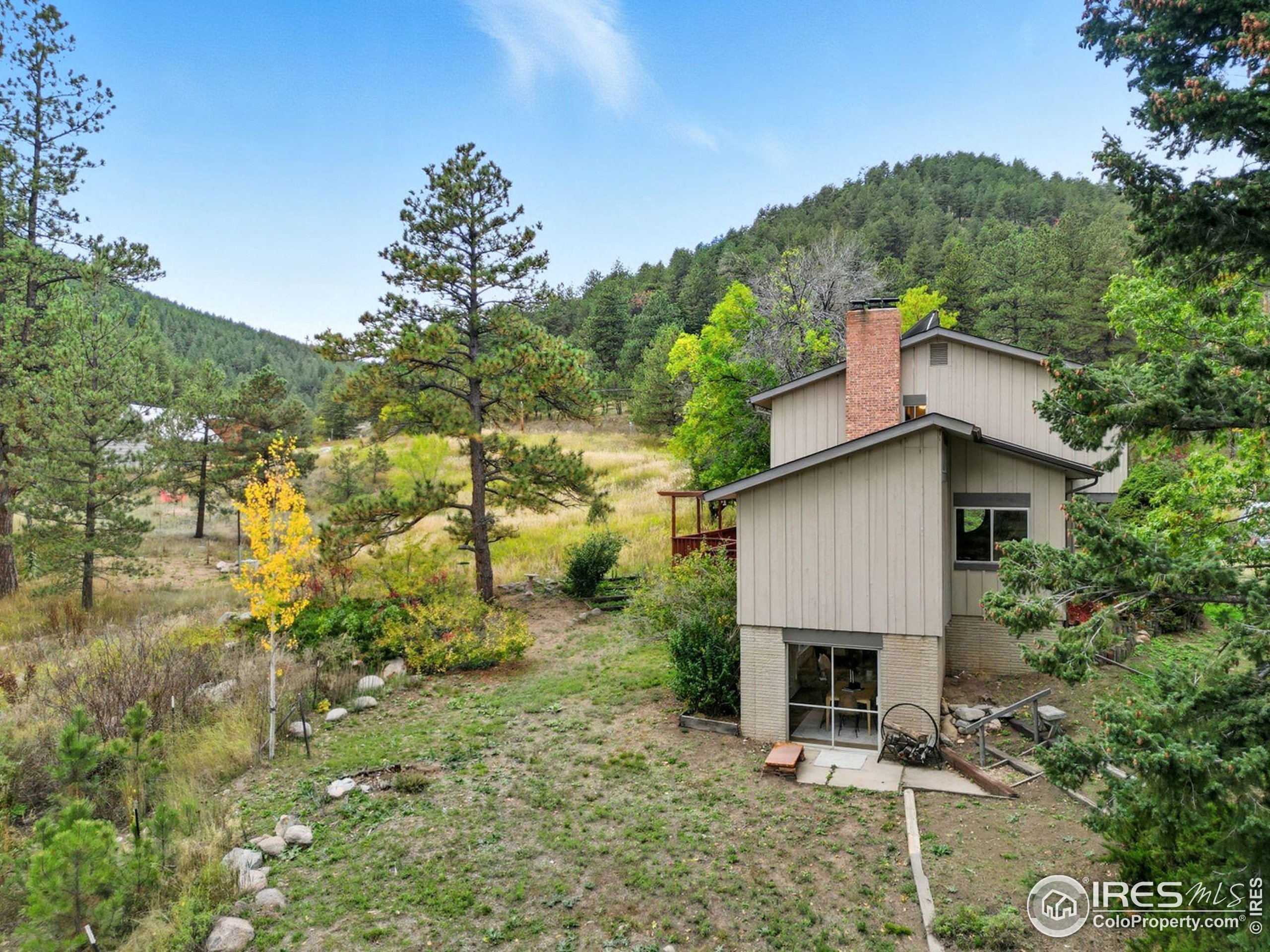 1037 Wagonwheel Gap Road Boulder, CO 80304 - Photo 11 of 43 a view of a house with balcony