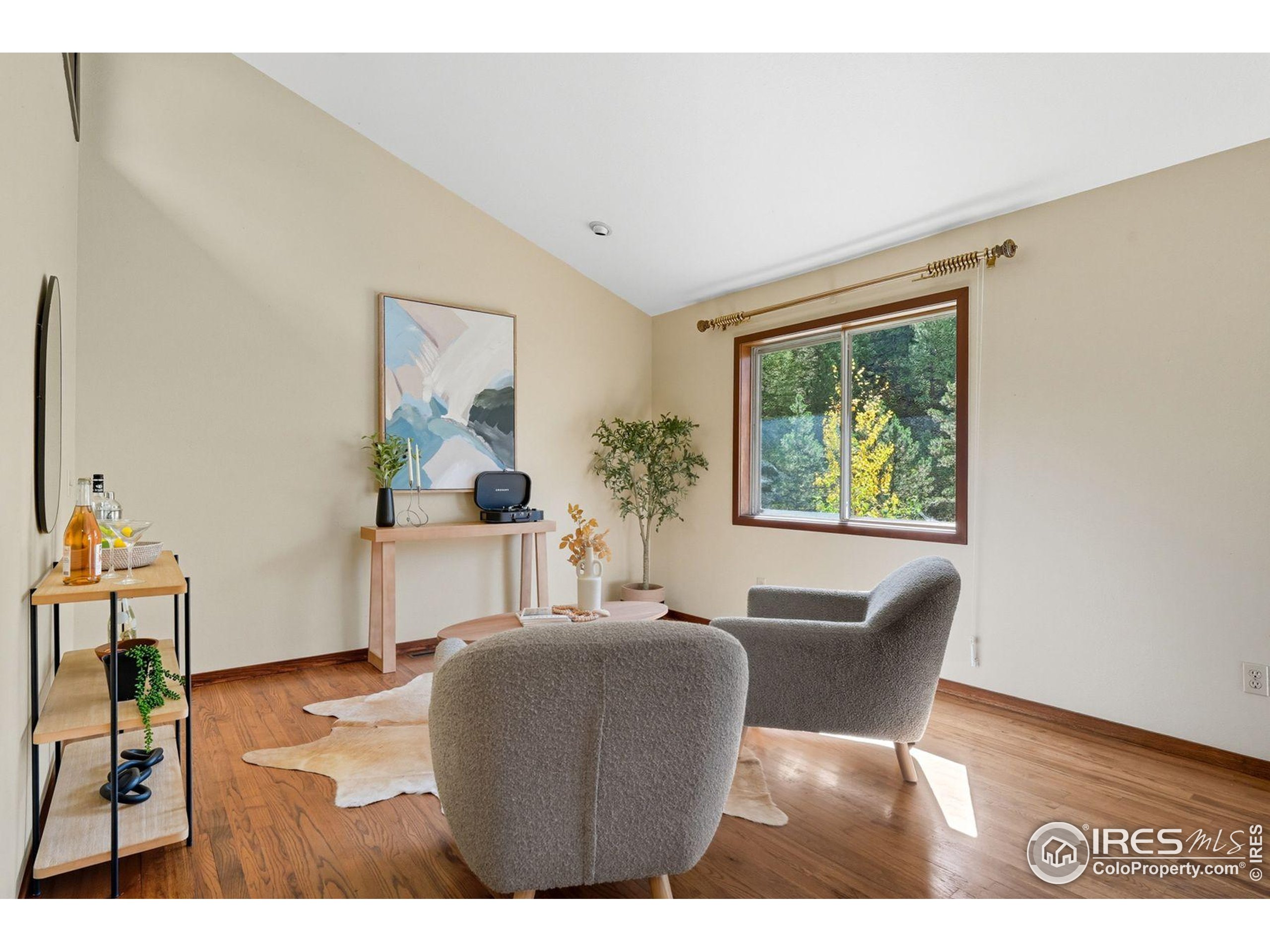 1037 Wagonwheel Gap Road Boulder, CO 80304 - Photo 18 of 43 a dining room with furniture and a window