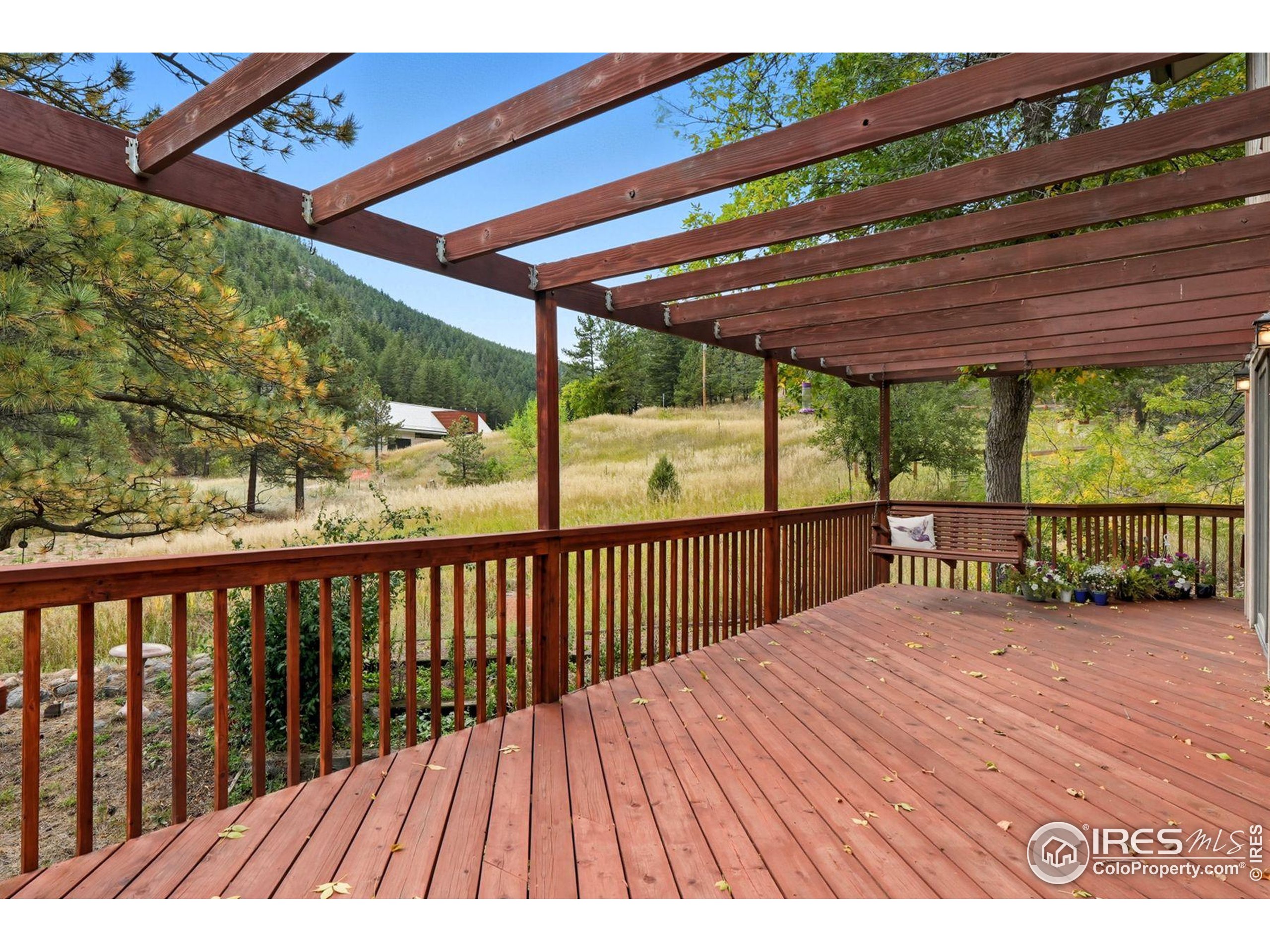1037 Wagonwheel Gap Road Boulder, CO 80304 - Photo 9 of 43 a view of a wooden deck