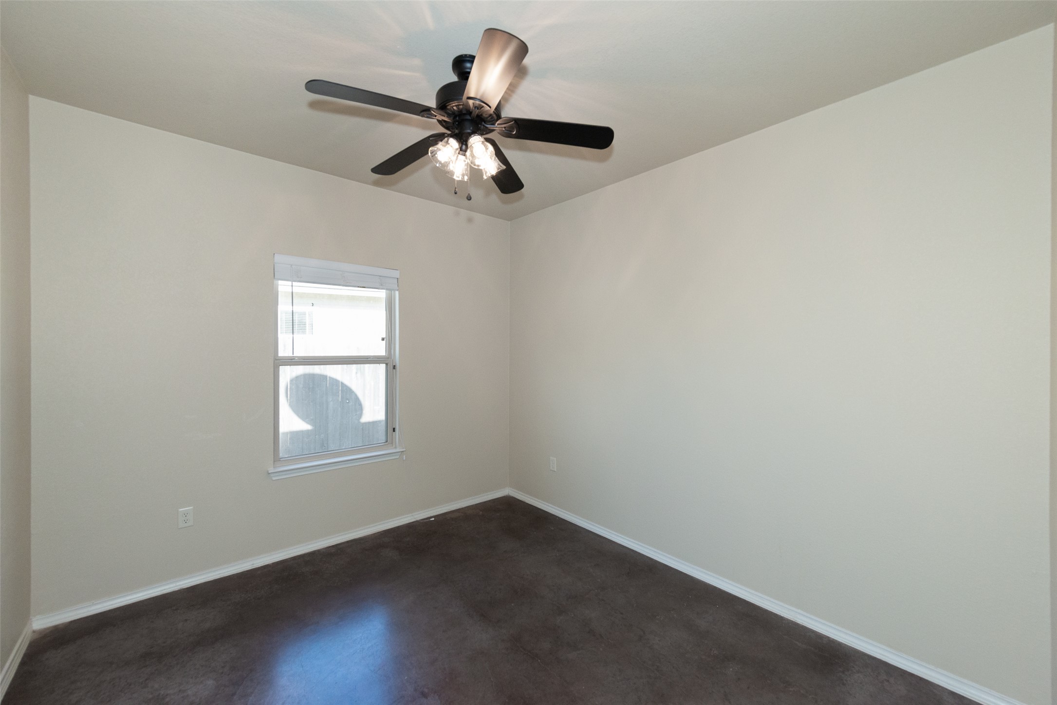 245 Joanne Loop, Unit B Buda, TX 78610 - Photo 14 of 33 Bedroom #2 with closet, all bedrooms have blinds and ceiling fans
