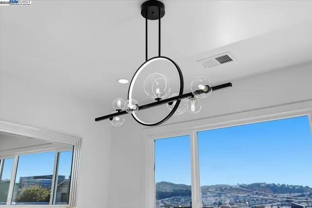 a spacious bedroom with a bed and a couch