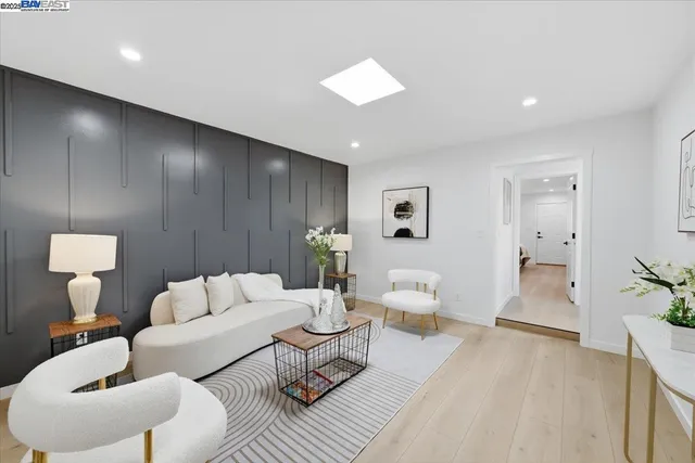 a bathroom with a sink a mirror and a toilet