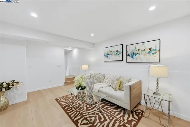 a view of a yard with wooden fence