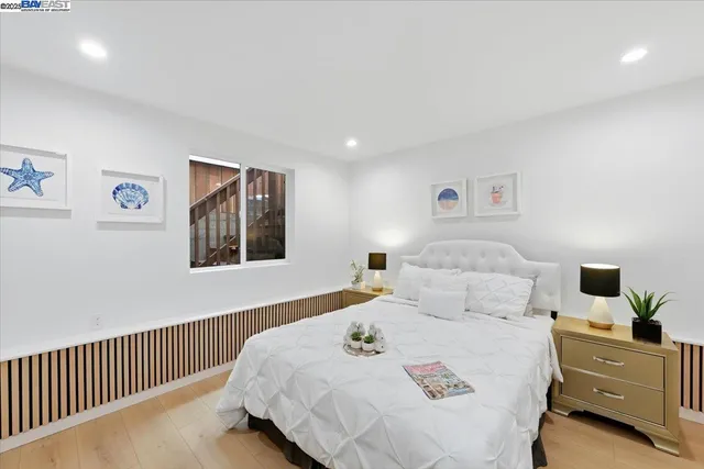 a view of a backyard with wooden fence