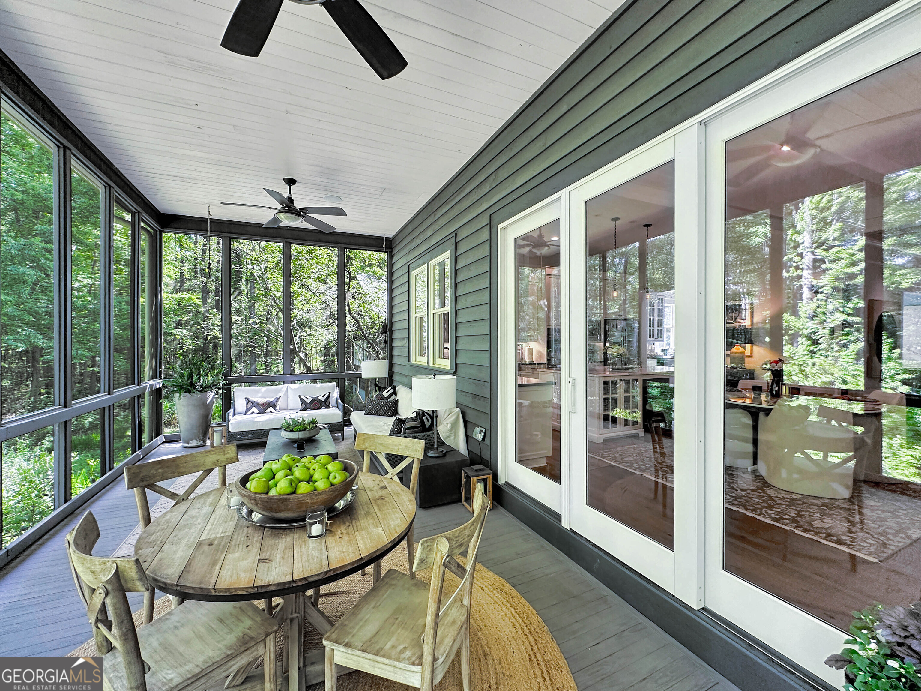500 Augusta Lane Chattahoochee Hills, GA 30268 - Photo 26 of 49 a living room with furniture and a floor to ceiling window