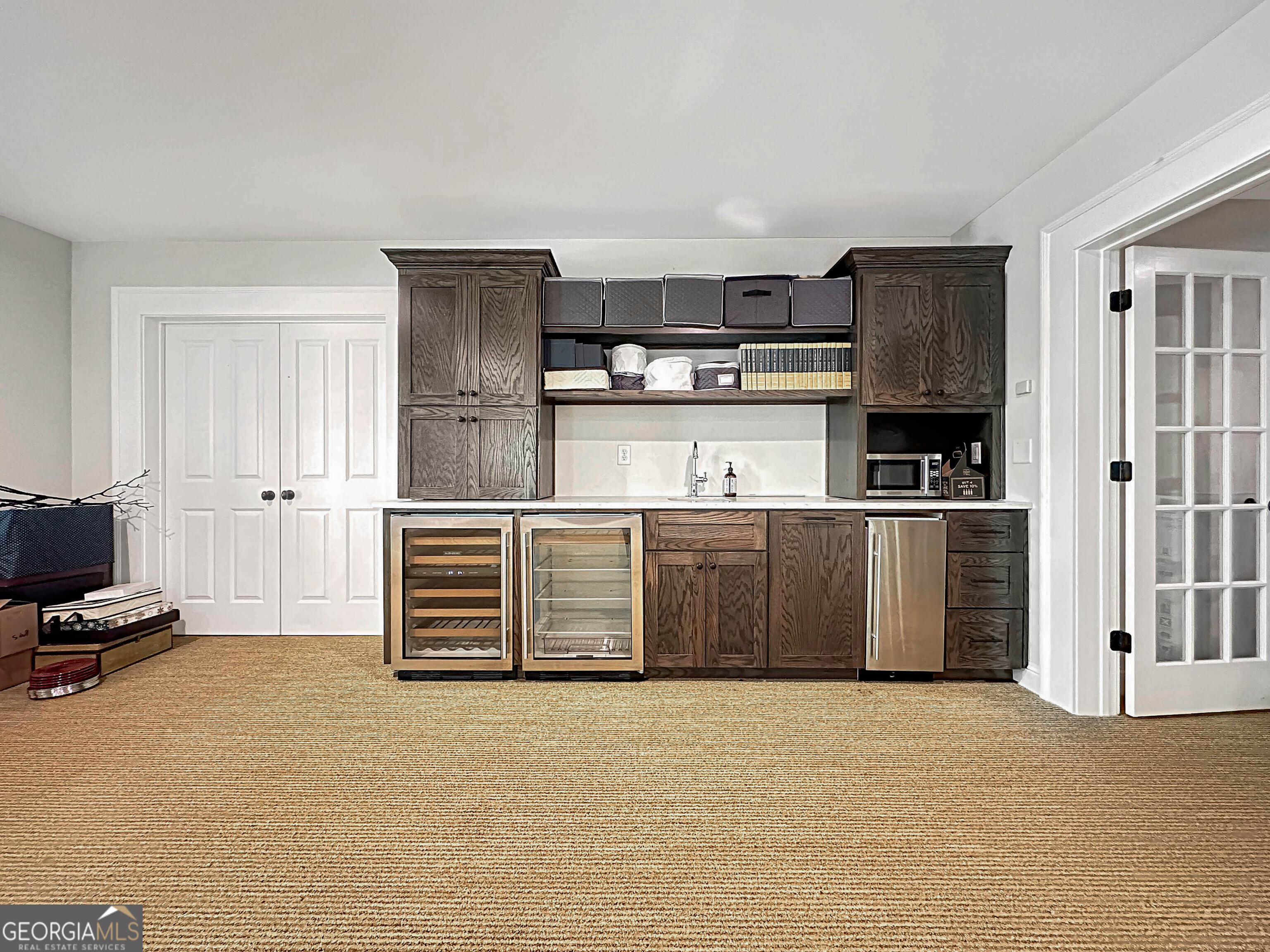 500 Augusta Lane Chattahoochee Hills, GA 30268 - Photo 39 of 49 a kitchen with stainless steel appliances granite countertop a refrigerator and a stove