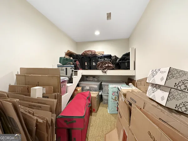 a view of living room with furniture and a couch