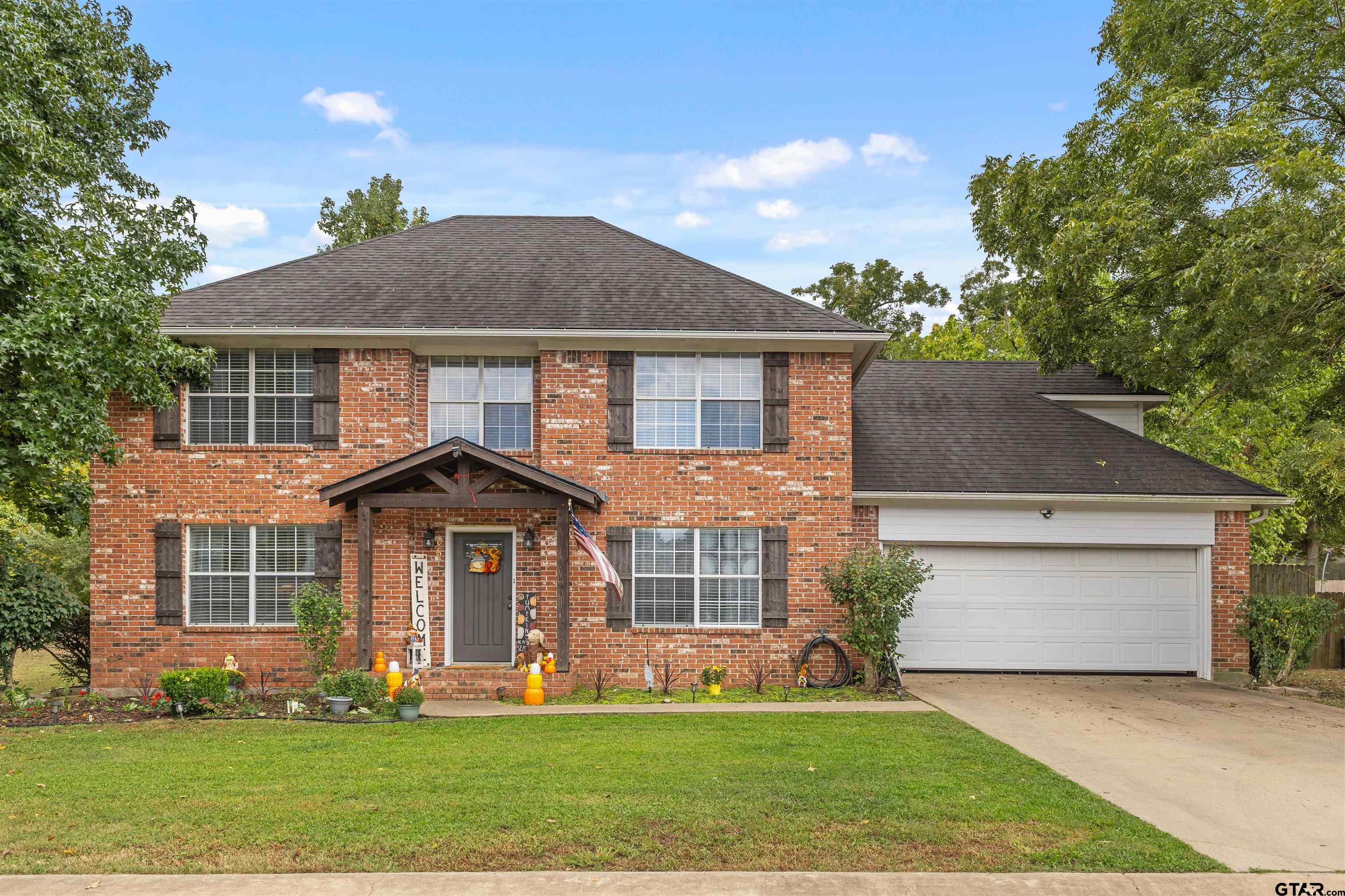 106 Pecan Ridge Mount Vernon, TX 75457 - Photo 1 of 31 front view of a house with a yard