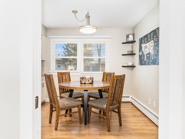 1506 Meadows Road Geneva, IL 60134 - Photo 9 of 33 a view of a dining room with furniture window and outside view