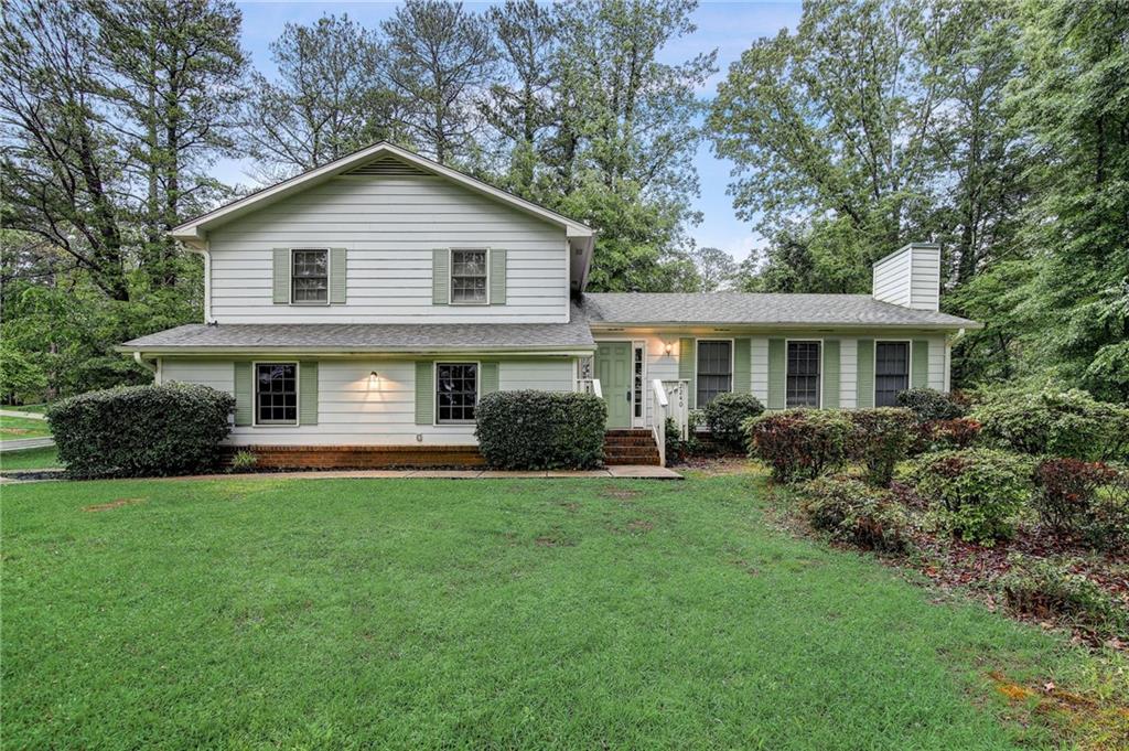 2240 Provence Court Marietta, GA 30066 - Photo 1 of 1 a front view of house with yard and green space
