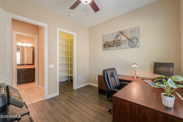 a view of a patio with couches and potted plants