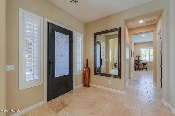 a view of a house with a yard and garage