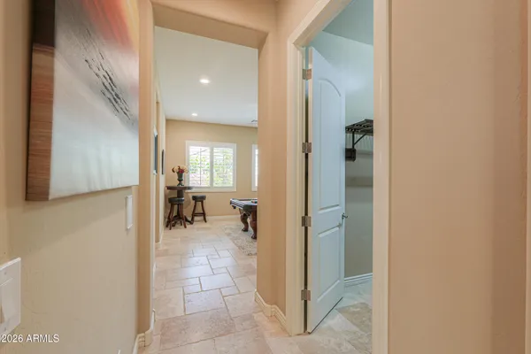 a bathroom with a granite countertop sink a toilet and a mirror