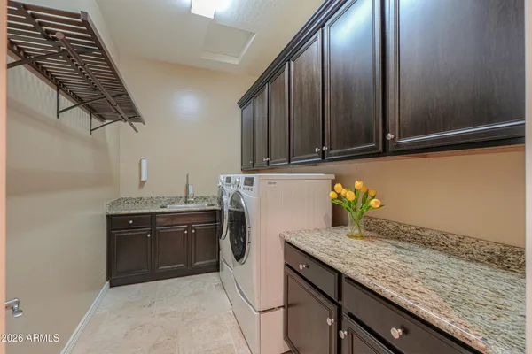 a view of a livingroom with a car parked in garage