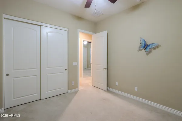 an aerial view of a house with outdoor space and lake view