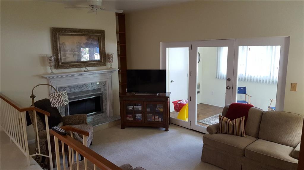 1301 Kenzie Road Pittsburgh, PA 15205 - Photo 3 of 14 Sunken living room with fireplace