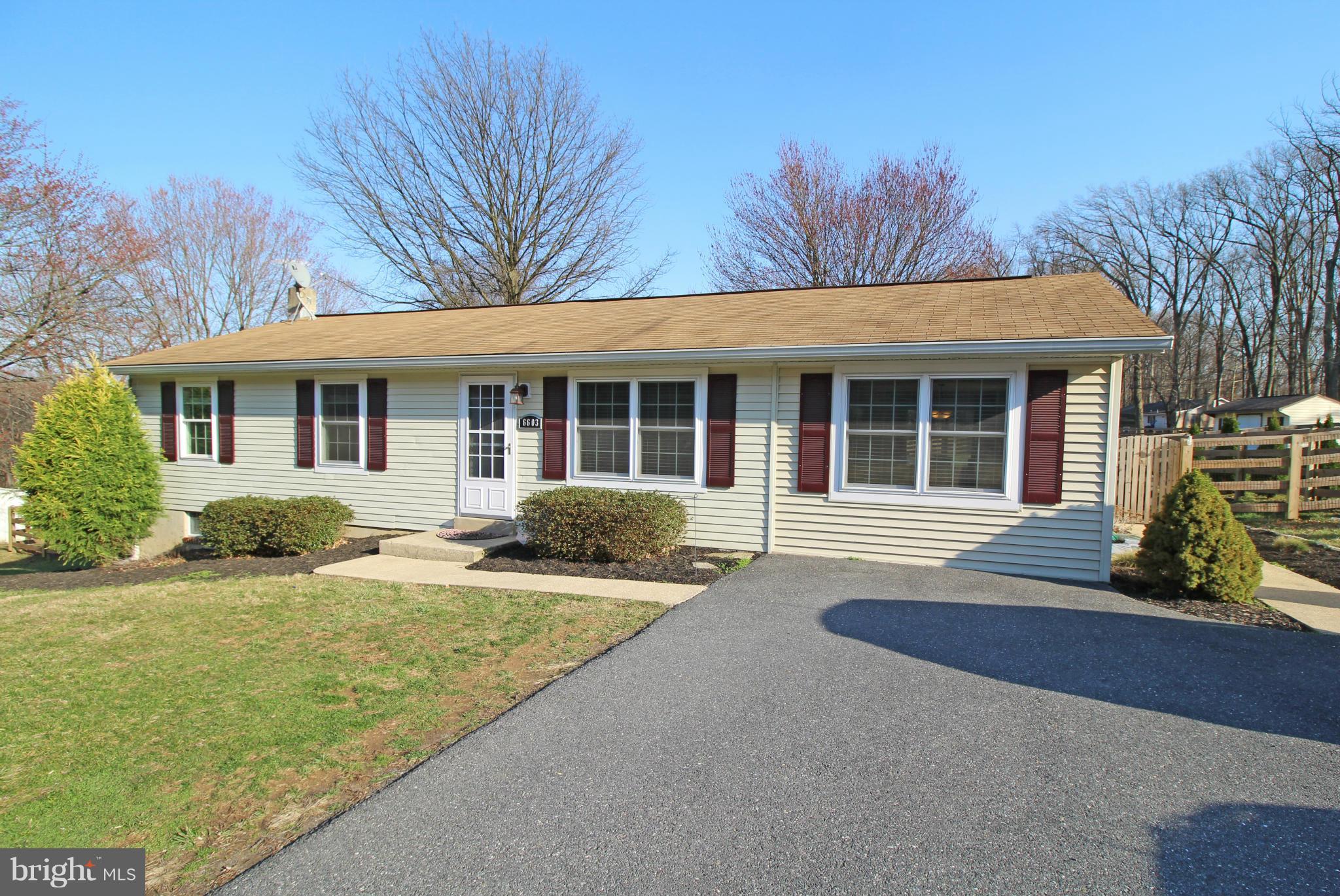 6603 South Clifton Road Frederick, MD 21703 - Photo 1 of 21 a front view of house with yard outdoor seating and green space
