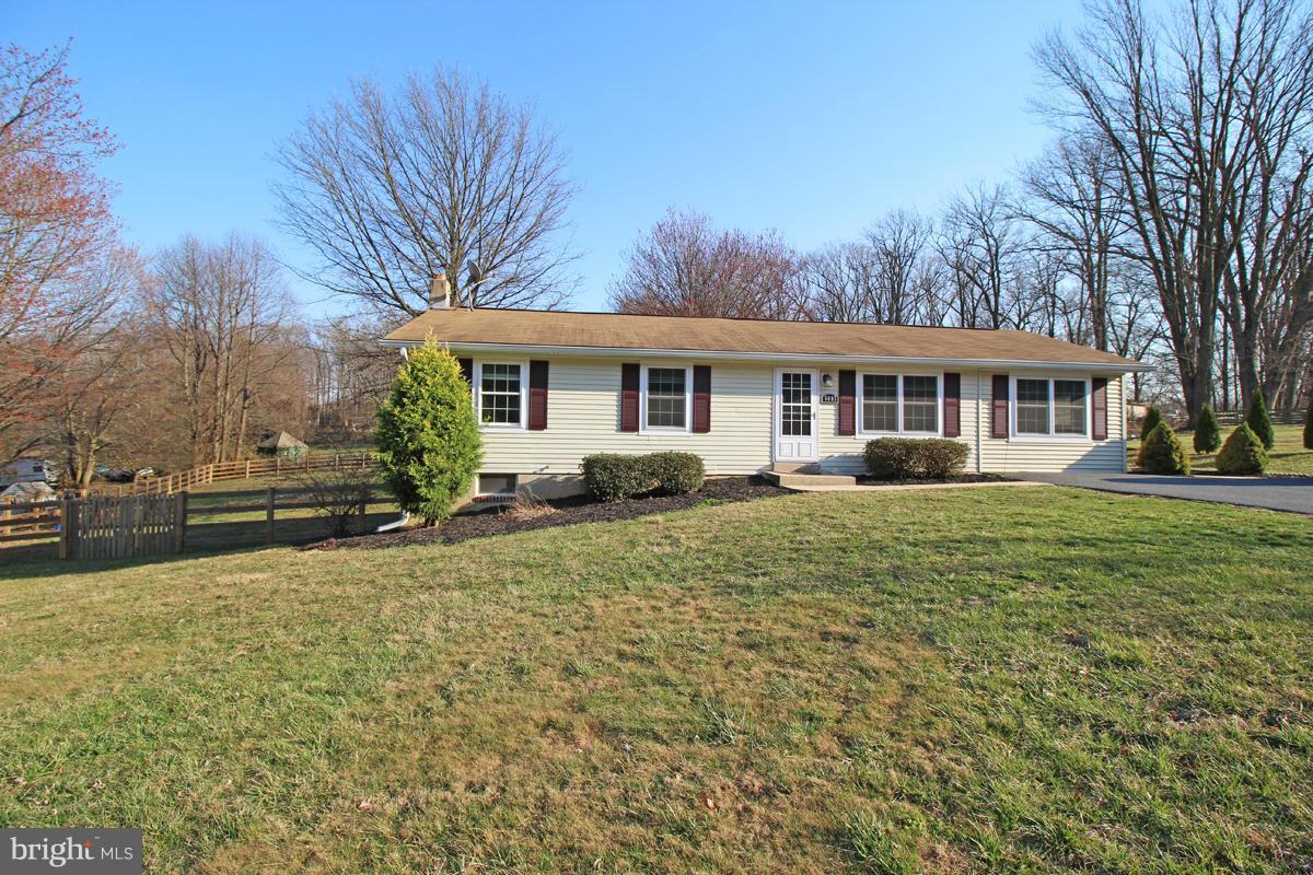 6603 South Clifton Road Frederick, MD 21703 - Photo 21 of 21 a house view with a garden space