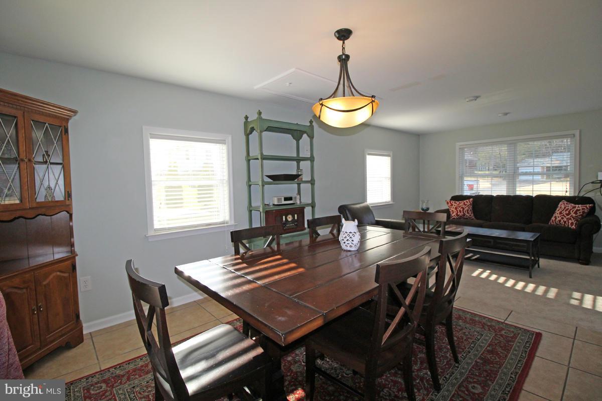 6603 South Clifton Road Frederick, MD 21703 - Photo 9 of 21 a view of a dining room with furniture