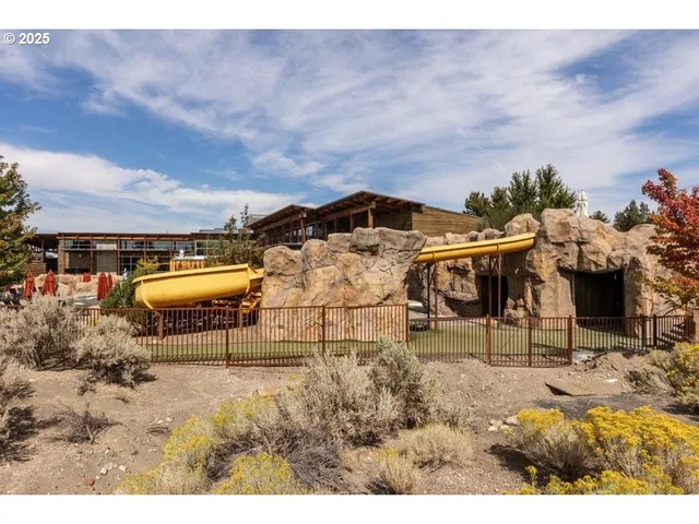a view of balcony with wooden floor
