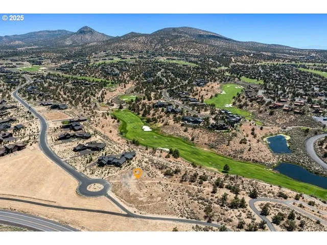 a view of a terrace with wooden floor and a city view