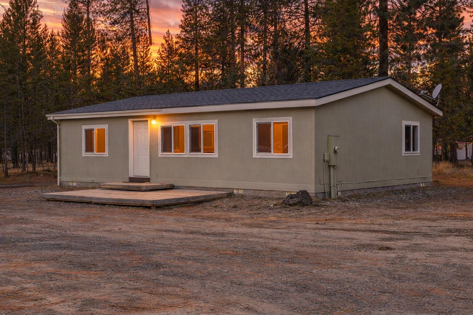 152224 Silver Spur Road La Pine, OR 97739 - Photo 1 of 55 Sunset over a serene forest home