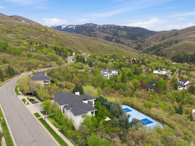 1878 East Ridge Point Drive Bountiful, UT 84010 - Photo 77 of 92 Aerial view of residential area featuring a mountainous background