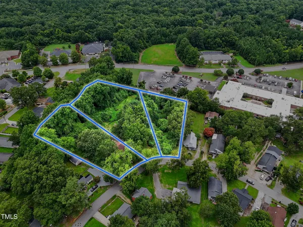 an aerial view of house with yard
