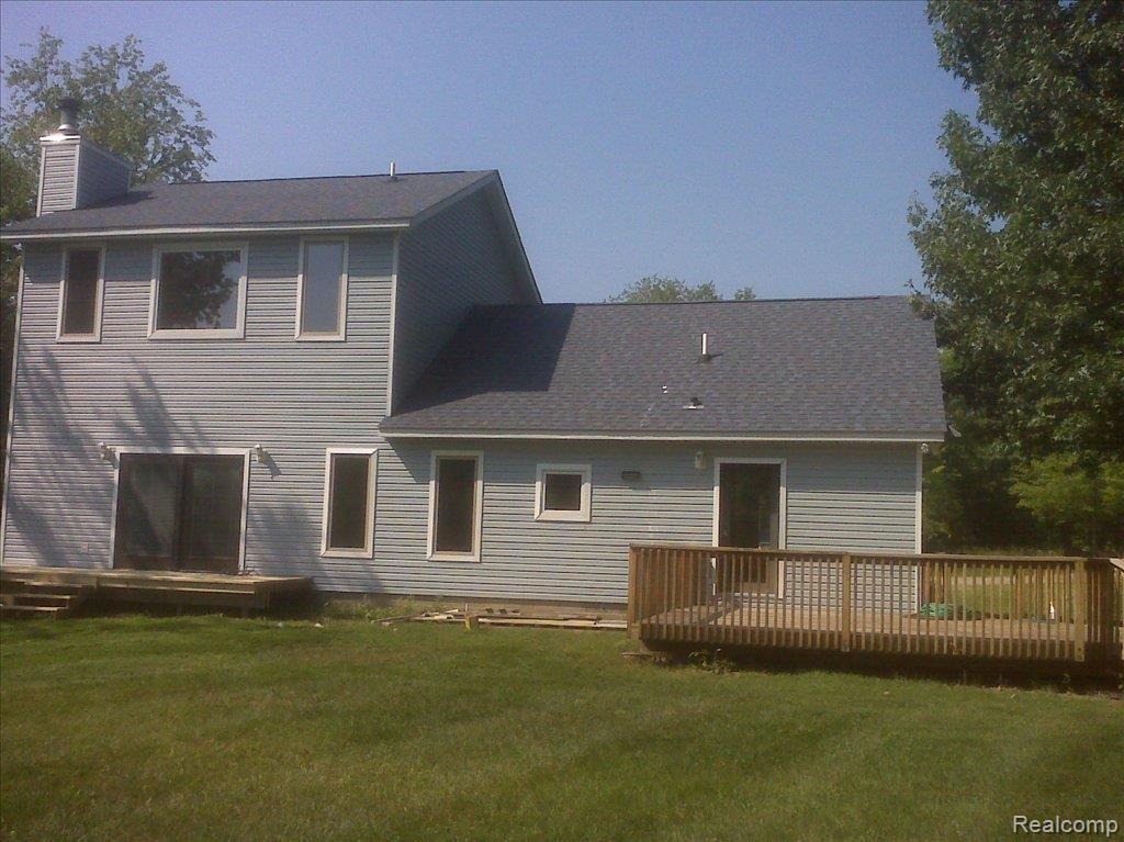 6918 Oak Grove Road Howell, MI 48855 - Photo 17 of 18 back of home 1