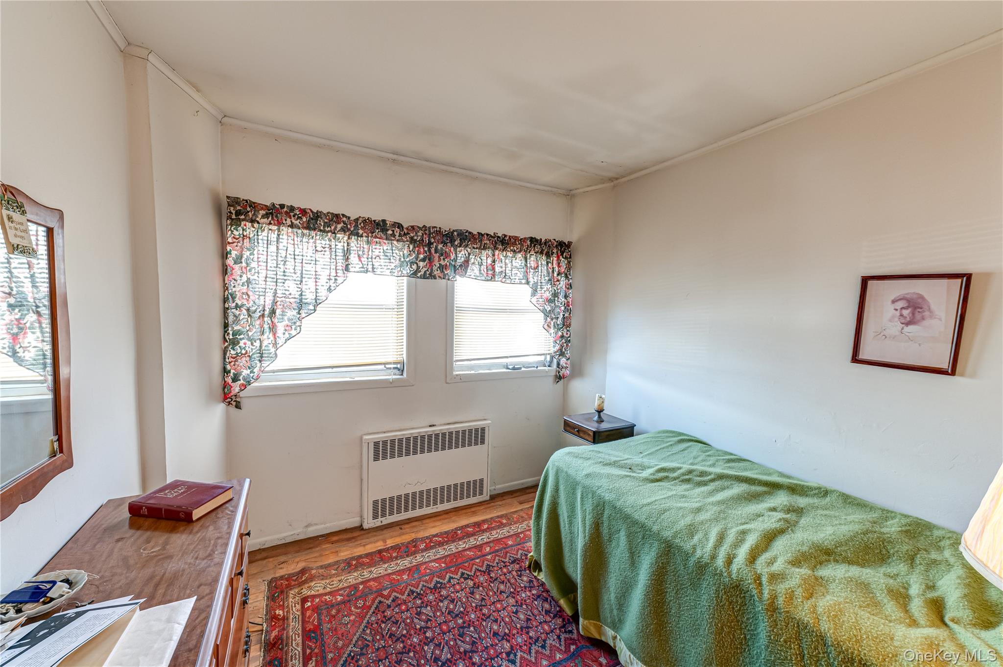 67 Edgewood Road West Islip, NY 11795 - Photo 16 of 31 a bedroom with a bed and a window