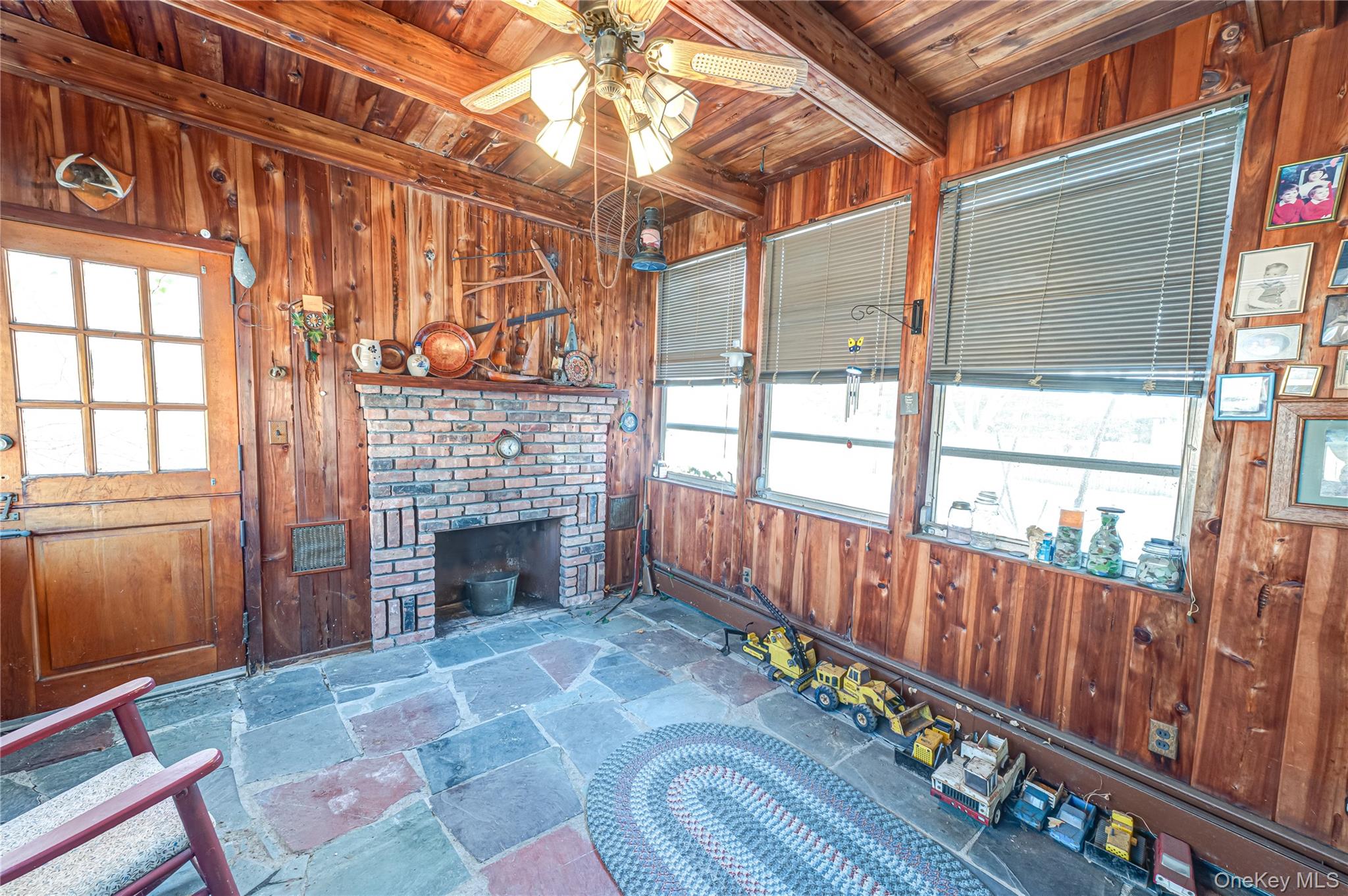 67 Edgewood Road West Islip, NY 11795 - Photo 18 of 31 a view of an entryway door with wooden fence