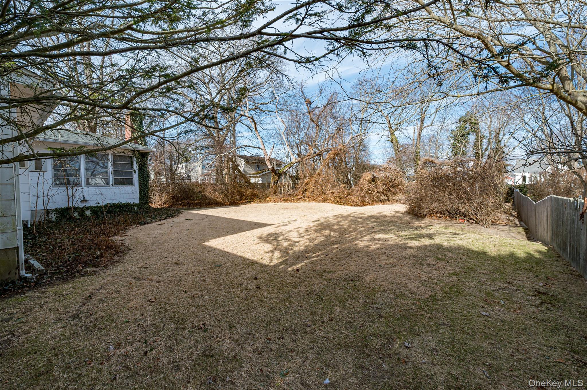 67 Edgewood Road West Islip, NY 11795 - Photo 30 of 31 a view of yard covered with snow in front of house