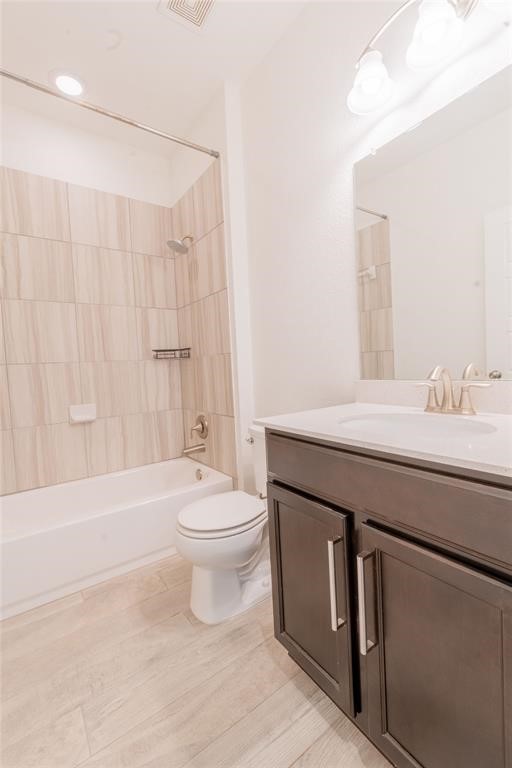 1333 Terrace View Drive Georgetown, TX 78628 - Photo 18 of 35 A well-appointed bathroom features a full bath, toilet, and a vanity with sleek storage.