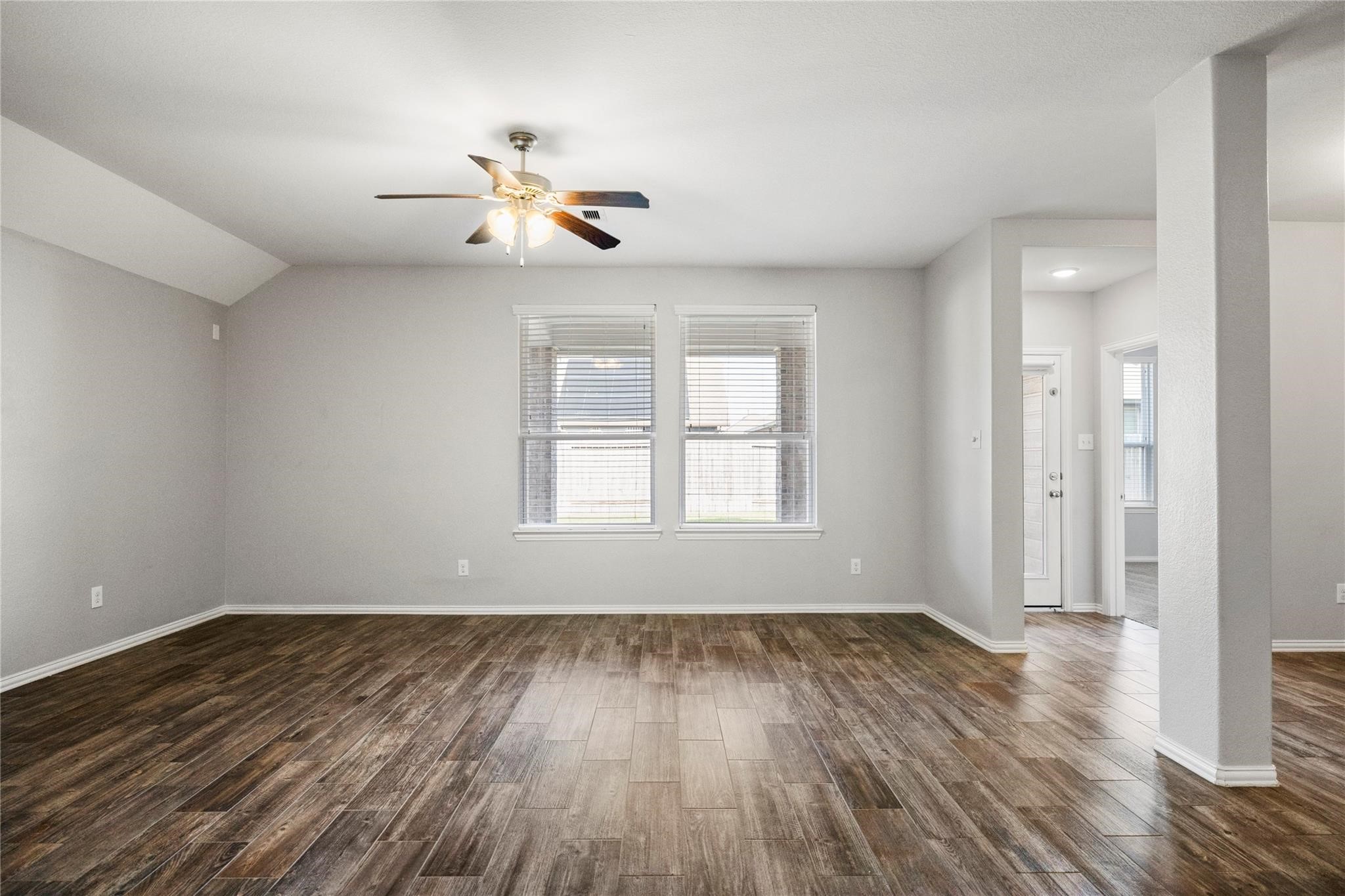 29507 Whitebrush Trace Drive Spring, TX 77386 - Photo 19 of 32 Open living area with ceiling fan and natural light.