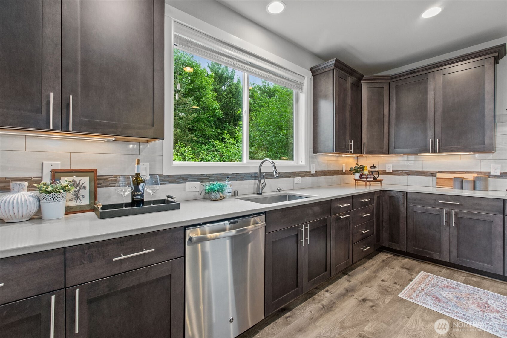 18231 3rd Drive Southeast Bothell, WA 98012 - Photo 11 of 40 a kitchen with a sink cabinets and window